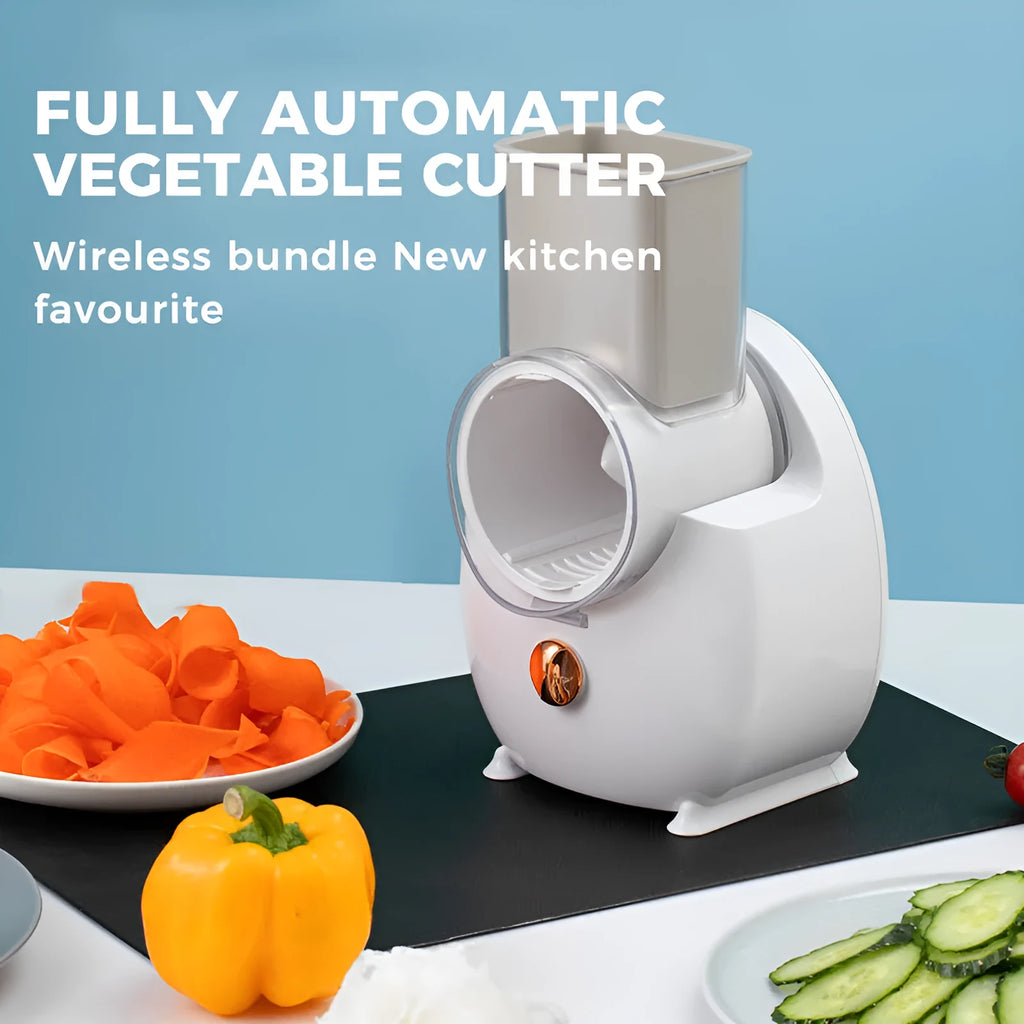 White and green electric vegetable slicer with suction base, feeding port, and multiple blades.