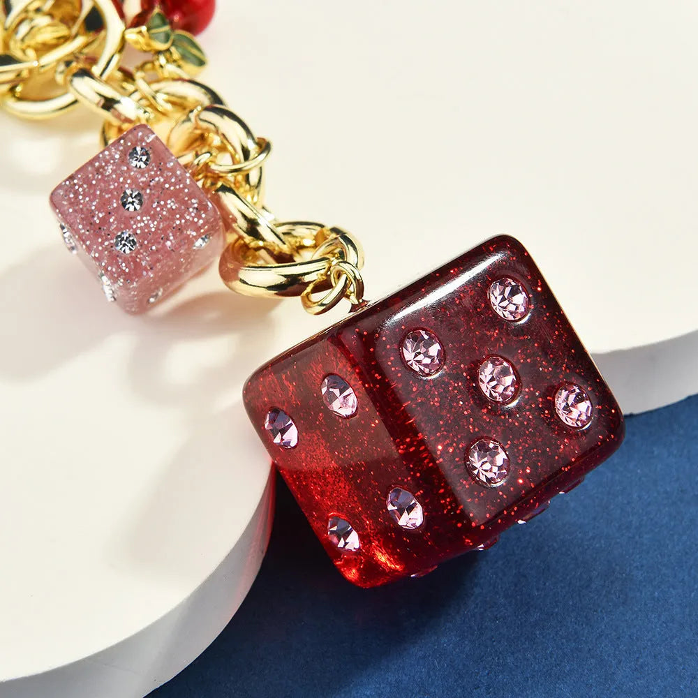 Square metal dice bag keychain pendant with cherry two-tone electroplated finish