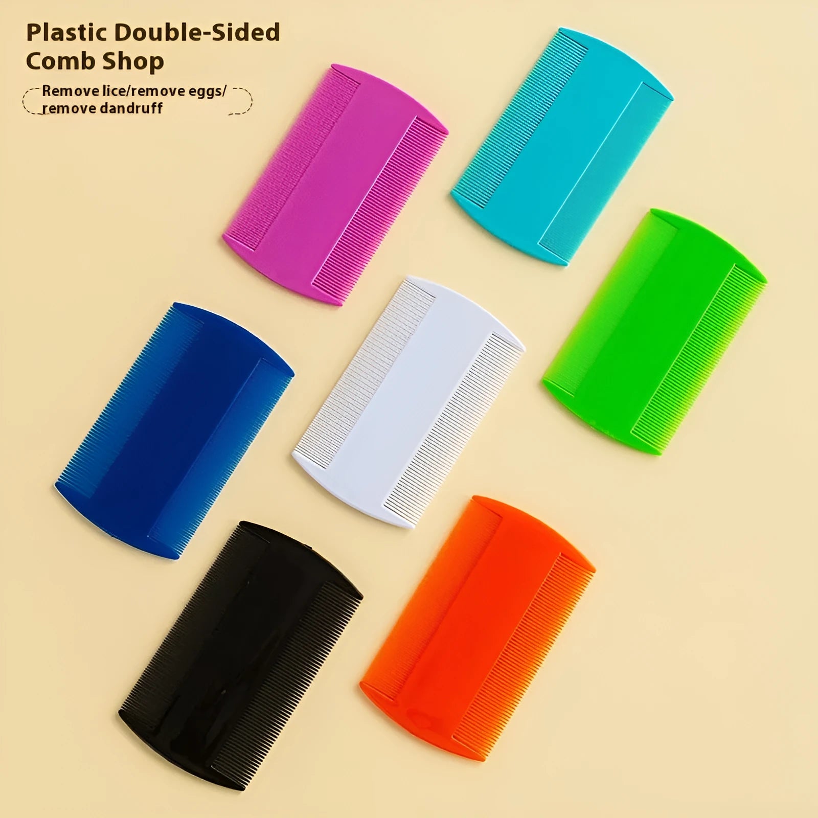 Double-edged plastic fine tooth flea and lice comb in assorted colours on a white background.