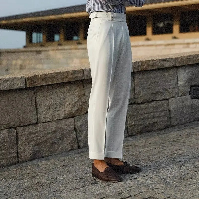 Men's slim fit straight-leg suit trousers in black, white, and apricot colours.