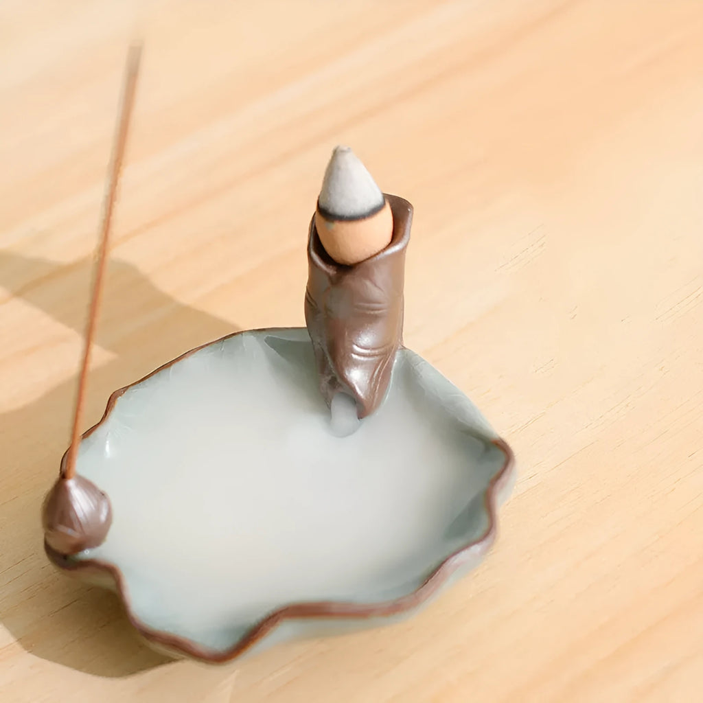 Ceramic reverse flow incense burner with purple clay construction and crystal glaze finish