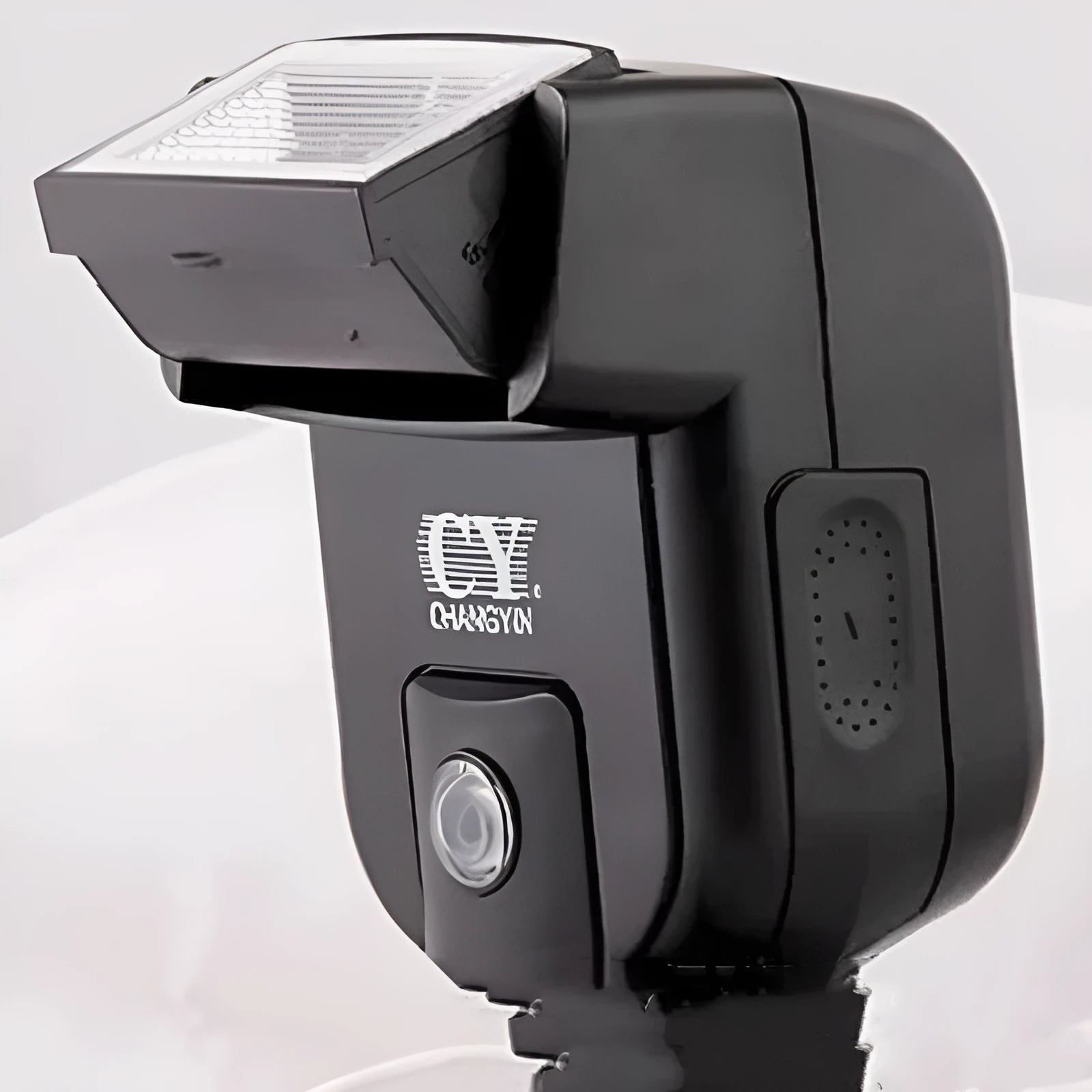 SLR camera flash unit with tilting head shown at 90-degree angle, compact 65x60x98mm design
