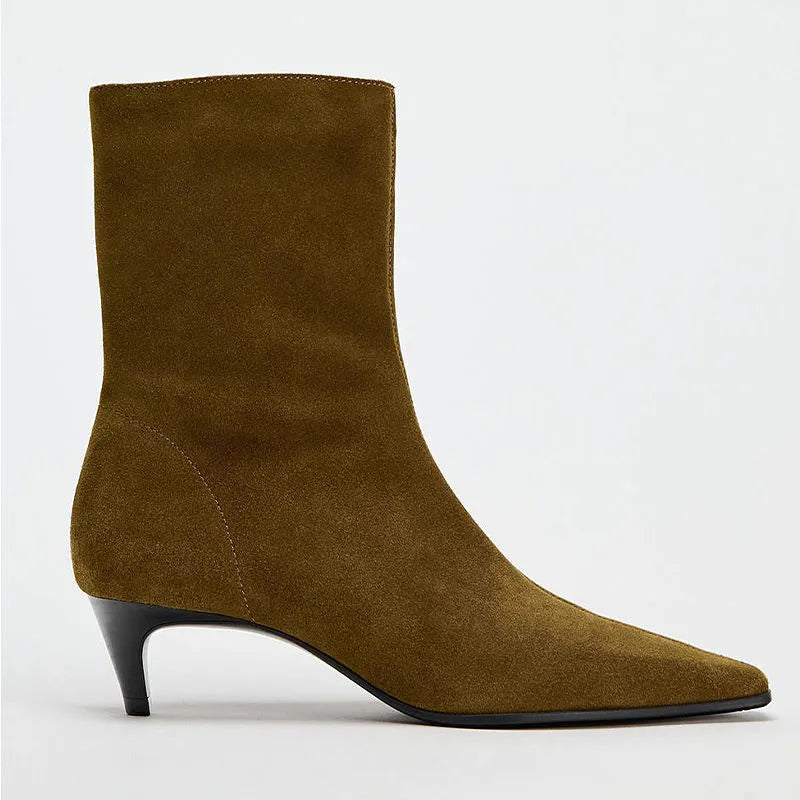 Brown women's square toe ankle boots with a side zipper and a mid stiletto heel on a waterproof platform sole.