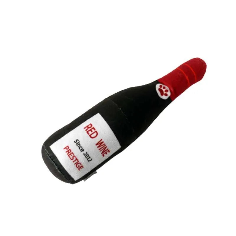 Green plush pet toy shaped like a wine bottle for dogs or cats to play with.