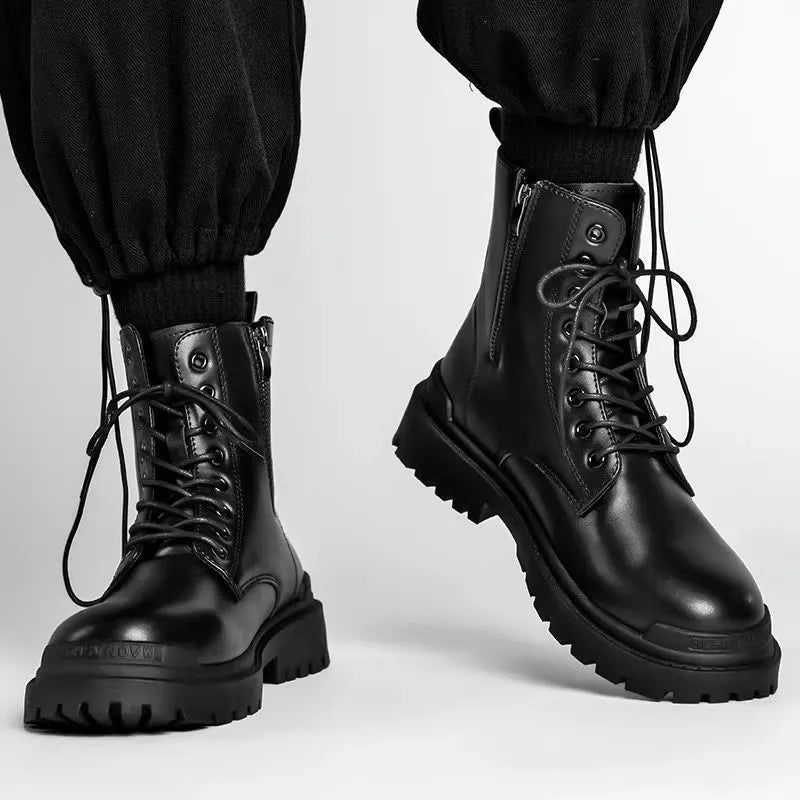 Men's black mid-top British style leather boots with a flat rubber sole.