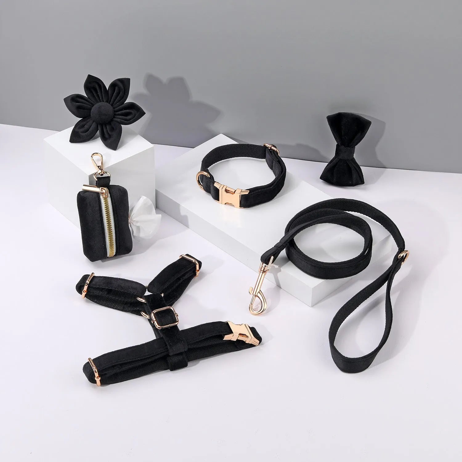 Classic velvet dog collar and matching lead set with chest strap, bow tie, and flower accessory in assorted colours.