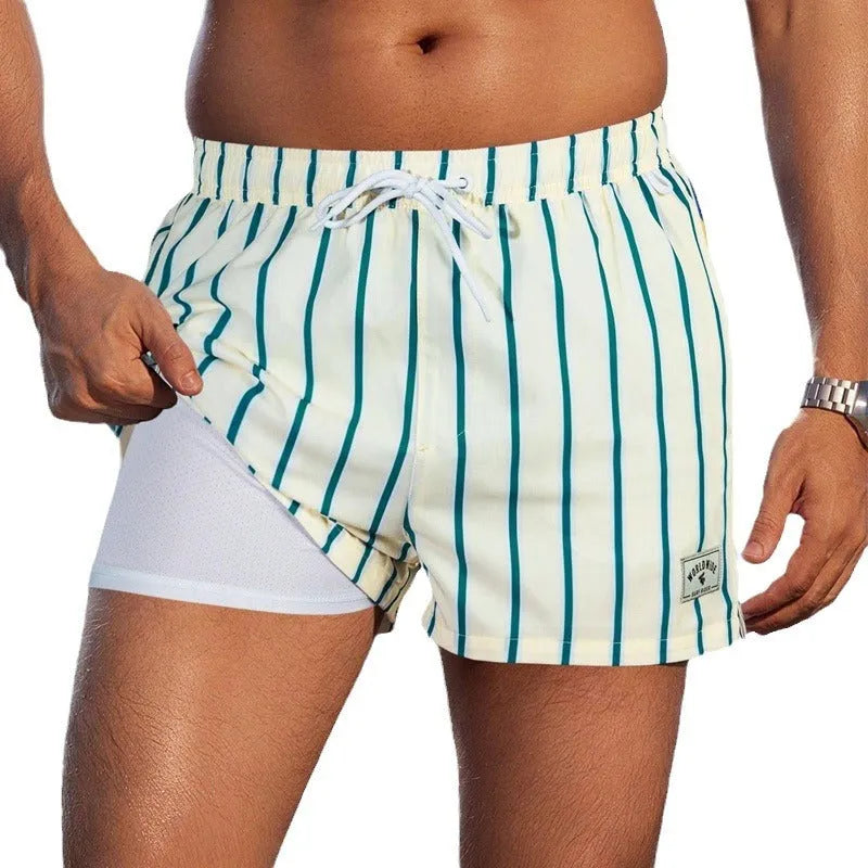 Men's loose fit quick-drying swimming trunks in various floral patterns and solid colours