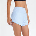Women's nylon high waist fitness shorts in black, white, and water blue colours for summer sports