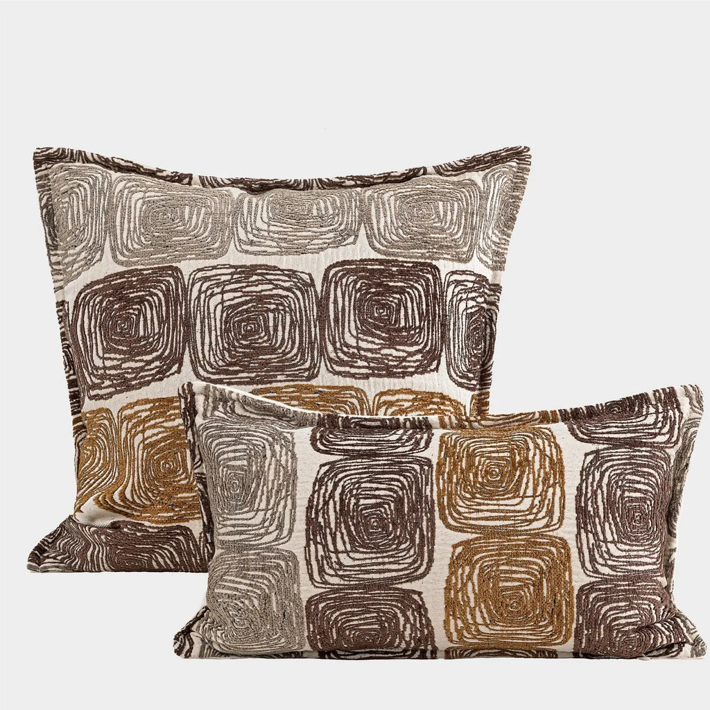 Cream and coffee-coloured abstract coil pattern pillow cover showing square and rectangular sizes