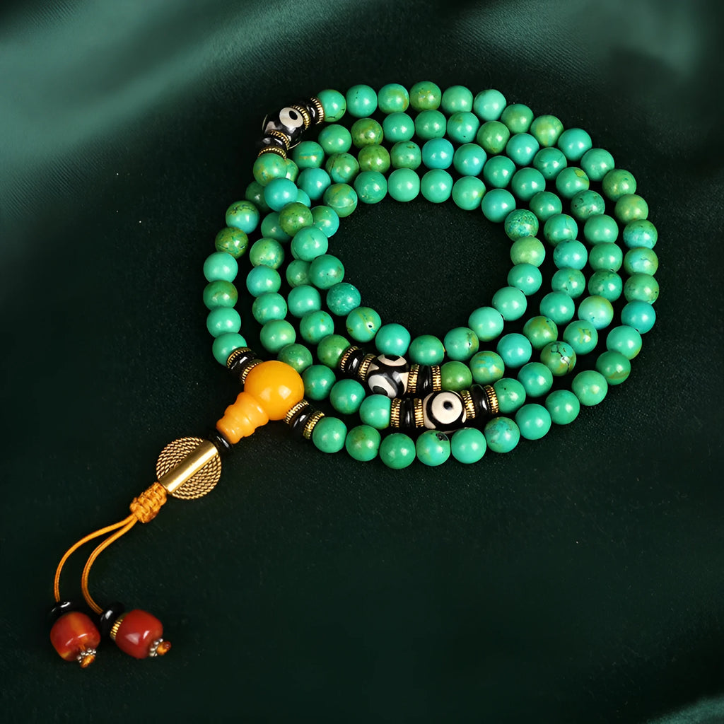 Natural turquoise bracelet with 108 round polished 8mm beads on a string.