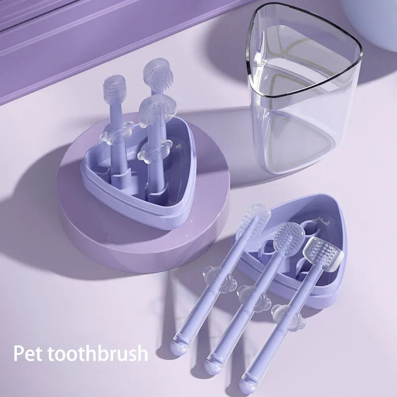 Purple silicone pet toothbrush with dual-ended design showing traditional brush head and finger brush