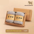Winter wool socks with thick merino midsole in four solid colour options showing packaging