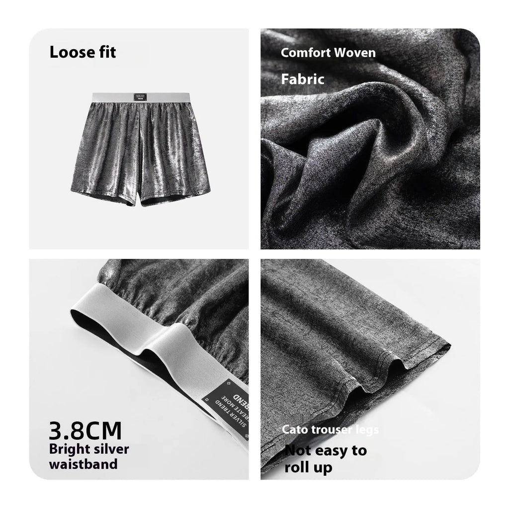 Man wearing galaxy reflective silver loose-fit woven polyester sports shorts.