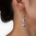 Blue and white porcelain ceramic bead long drop earrings with geometric alloy design