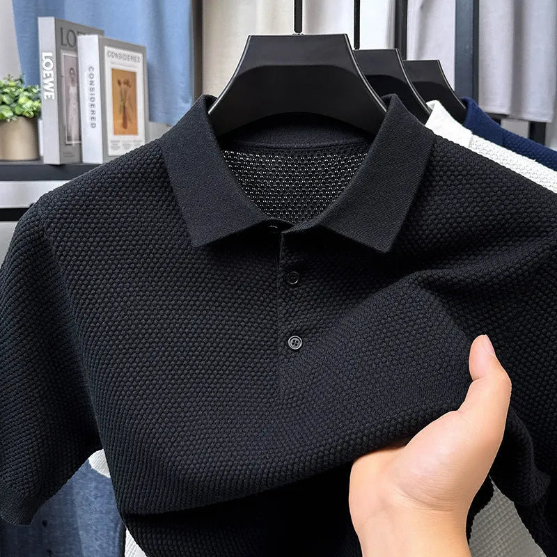 Loose fit pure cotton short sleeve pullover sweater shown in various colours including grey and navy.