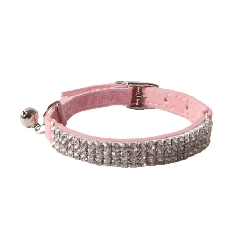 Soft flocking cat collar with an elastic buckle, shown in pink, black, red, blue, purple, and dark brown.