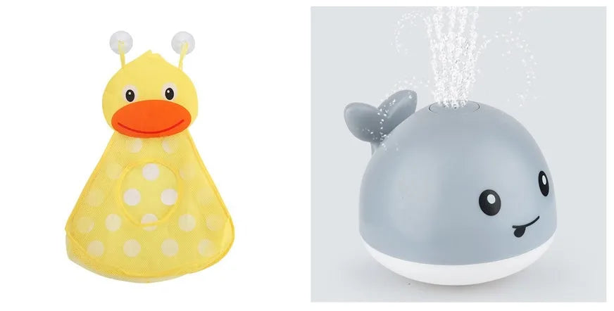 Blue and white whale bath toy with water spray and flashing lights for baby sensory play