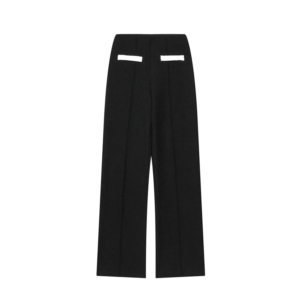 Women's two-piece suit with beaded round-neck top and high-waisted trousers on a hanger.