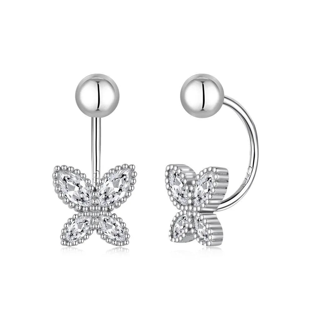 Pair of S925 silver bow-shaped ear hook earrings in gold finish on simple background
