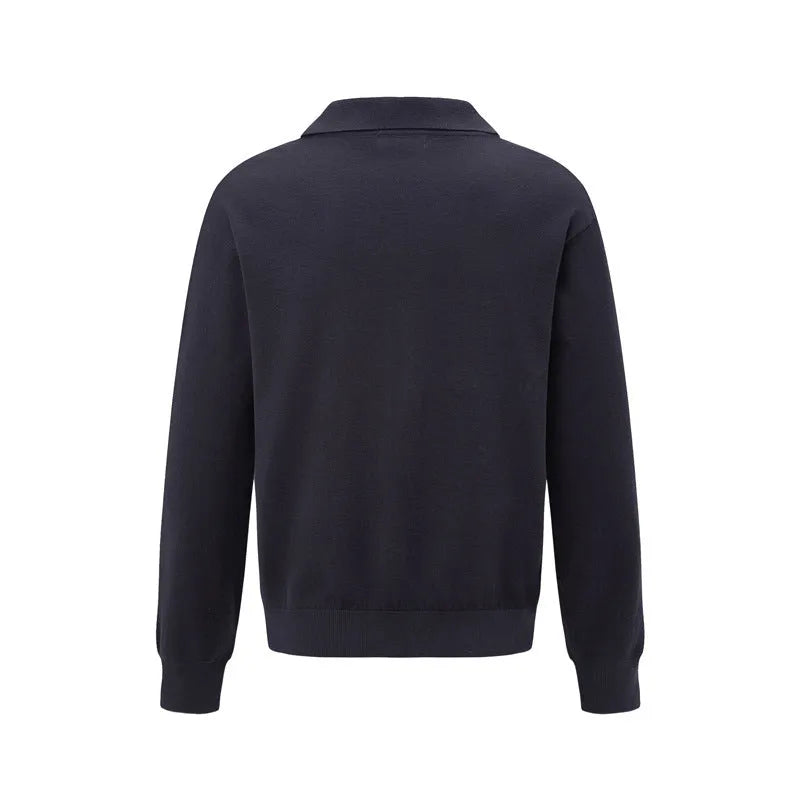 Loose fit black acrylic fibre blend pullover sweater on a hanger.