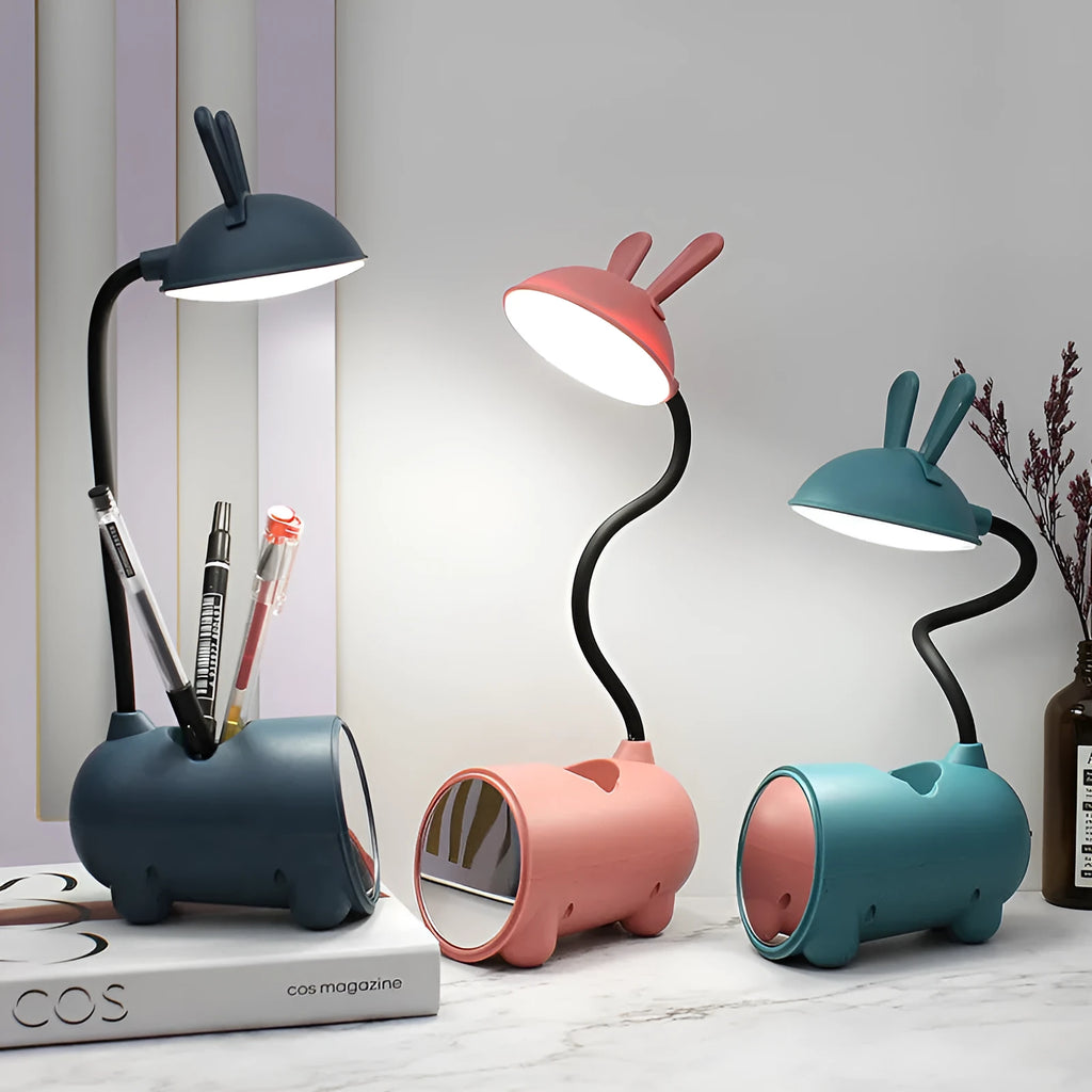 Cartoon-style USB desk lamp with pen container in green, dark blue or pink colour options