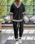 Two-piece trousers suit with V-neck cropped sleeve jacket in thin polyester fabric