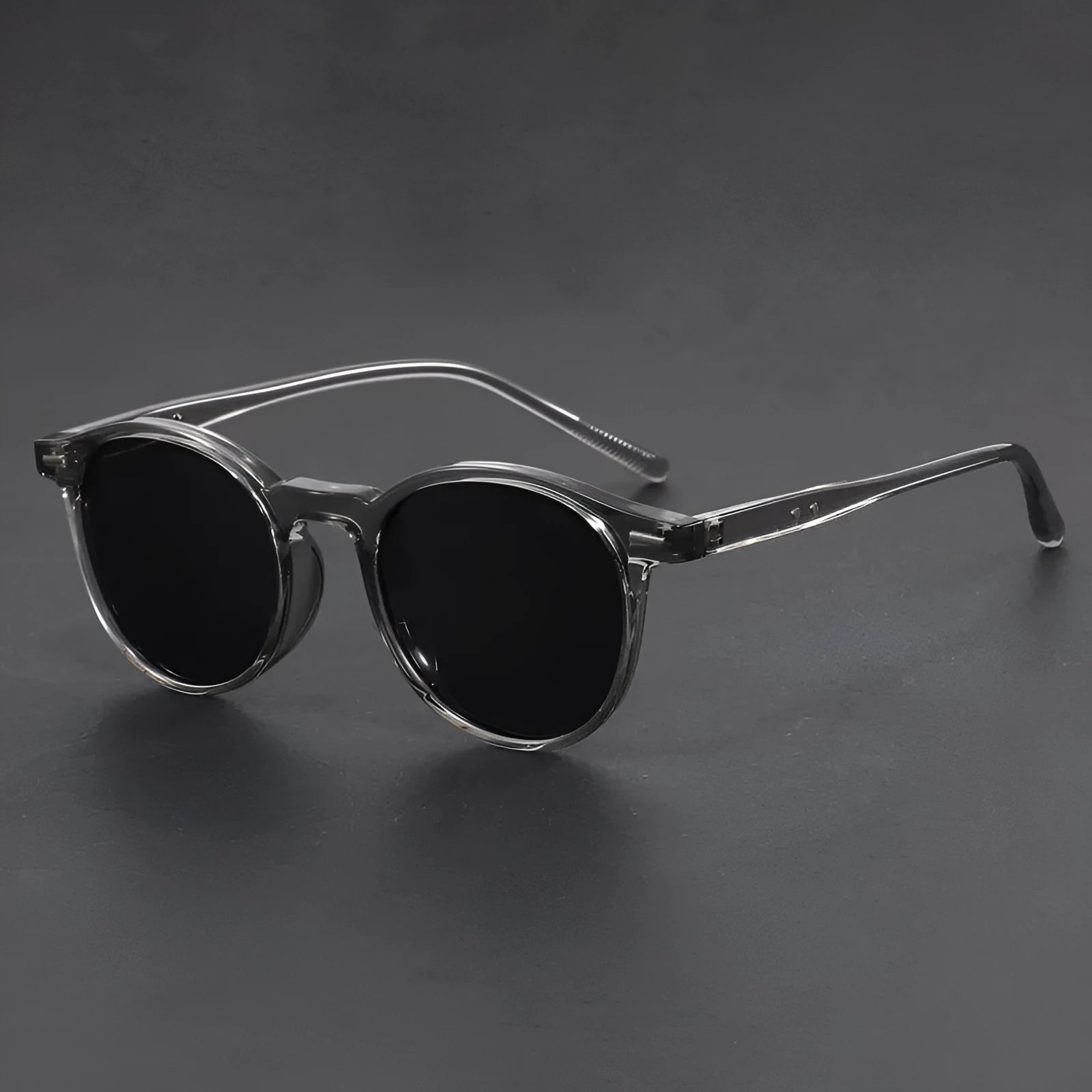 Round retro oval sunglasses with polarised lenses in Sand Black, Bright Black, Green, Gray, and Dry Tea frame colours.