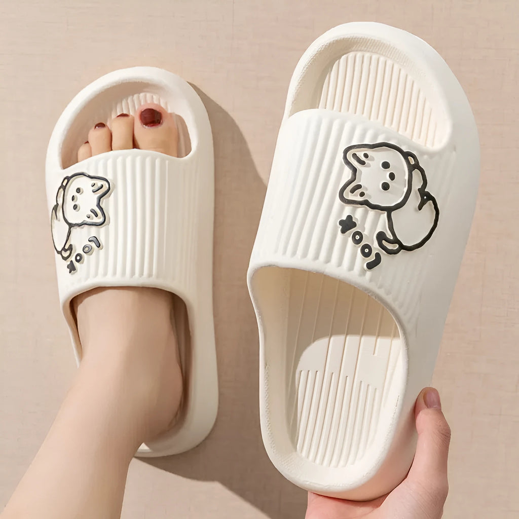 Women's pink cat-themed flip-flop slippers with a thick light blue EVA platform sole.