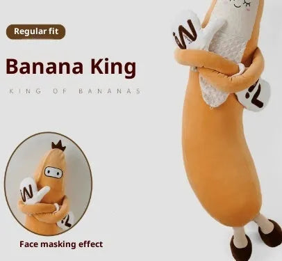 Banana King sleeping soft pillow toy in yellow plush with curved shape on a neutral background