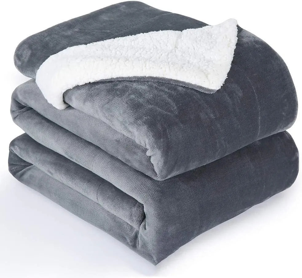Grey and white flannel USB electric heating blanket showing power cord and control unit.