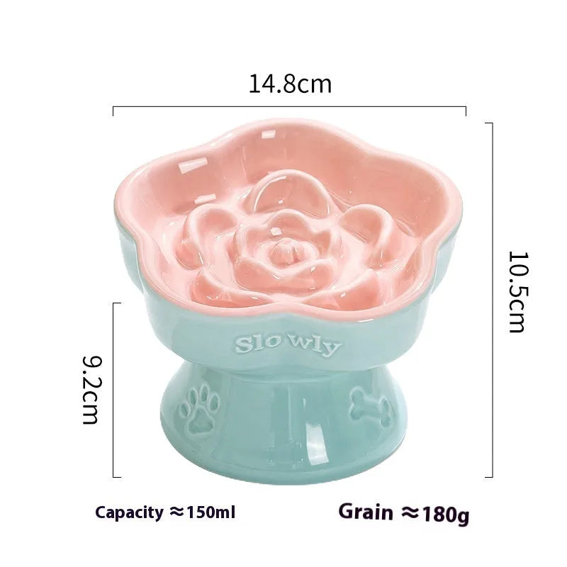 Black chin-high foot ceramic pet bowl for dogs and cats on a flat surface.