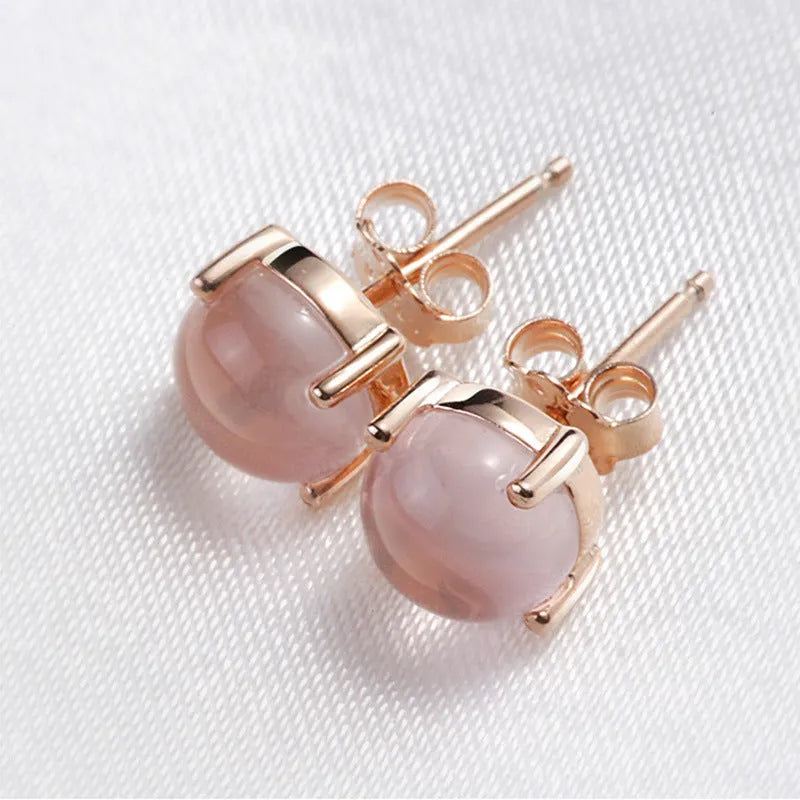 Rose gold drop-shaped stud earrings with synthetic quartz crystal inlay in Korean minimalist style