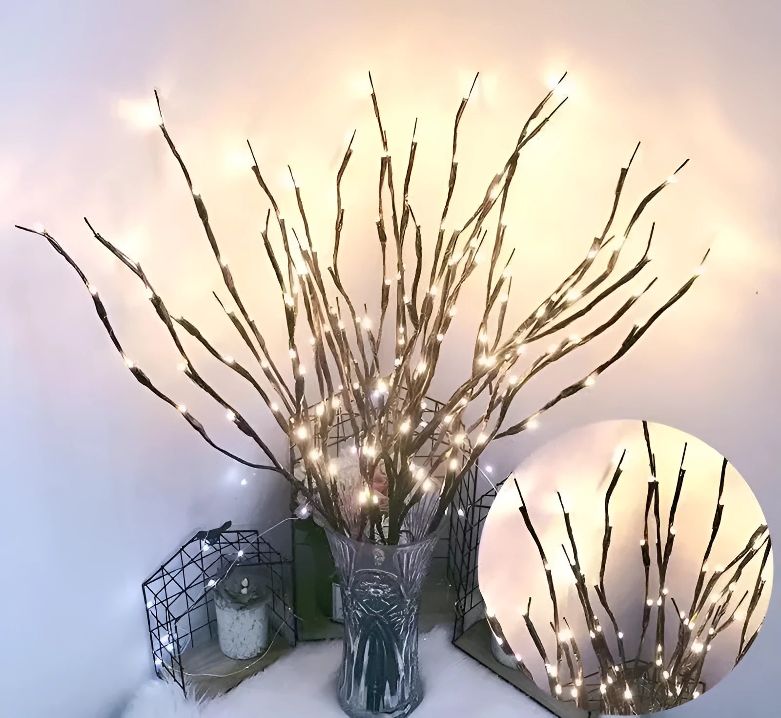 LED decorative tree light in a vase with silver branches illuminated in a choice of six colours.