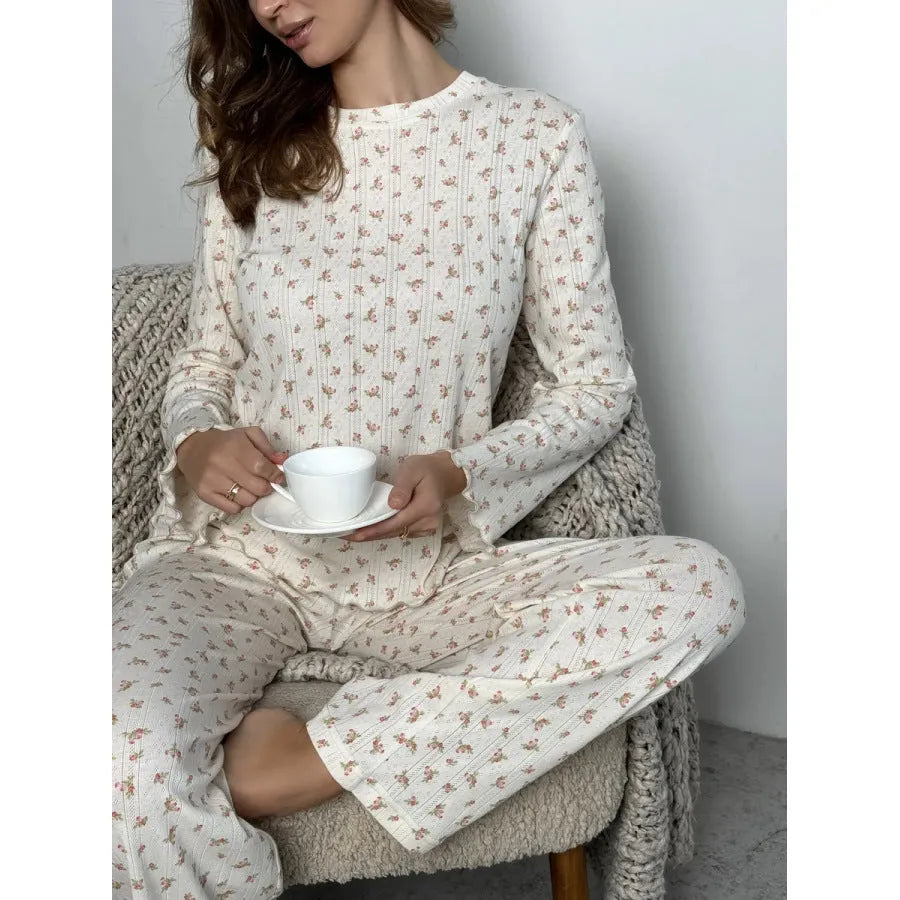 White floral print women's lounge suit with bell sleeve top and wide leg trousers