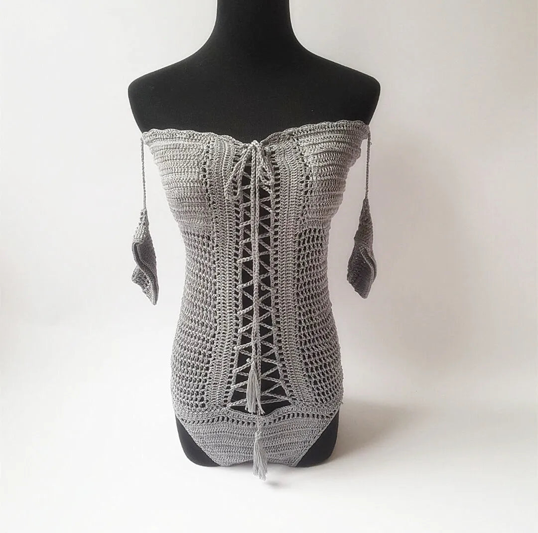 Off-shoulder one-piece swimsuit in polyester fabric on mannequin