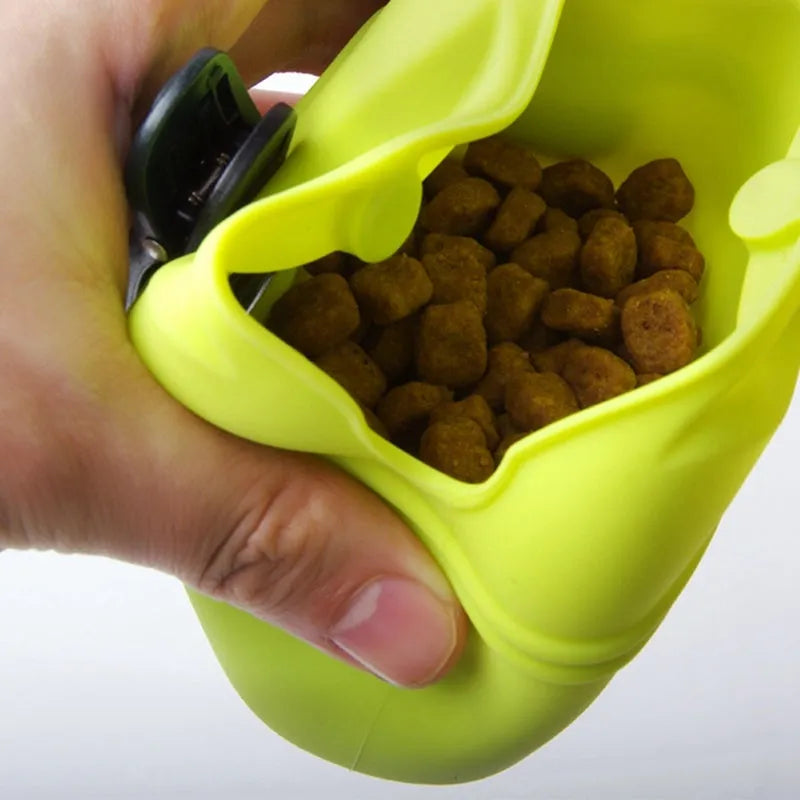 A silicone dog training treat pouch with a clip and magnetic closure, shown in one of six colour options.
