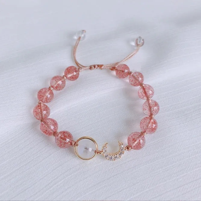 Hetian jade and strawberry quartz crystal bracelet for women showing manual craftsmanship and natural stone variations