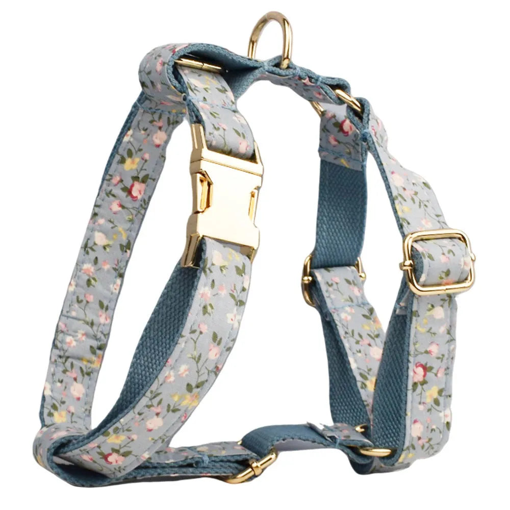 Blue floral polyester cotton dog collar set with matching leash, vest, bow and accessories