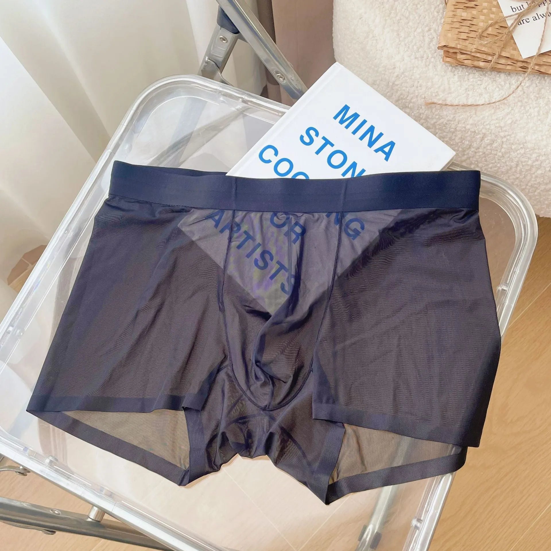 Men's thin seamless boxer shorts in knit nylon fabric, shown in light brown colour with quick-dry and breathable properties.
