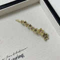 Gold alloy hair barrette with five-pointed star decoration for women's hairstyling
