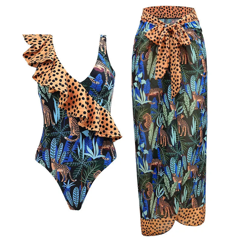 Solid colour women's one-piece swimsuit with thin spaghetti straps and a matching detachable skirt.