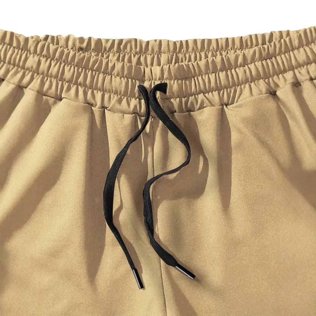 Men's khaki coconut print sports shorts with straight fit and micro elastic polyester fabric