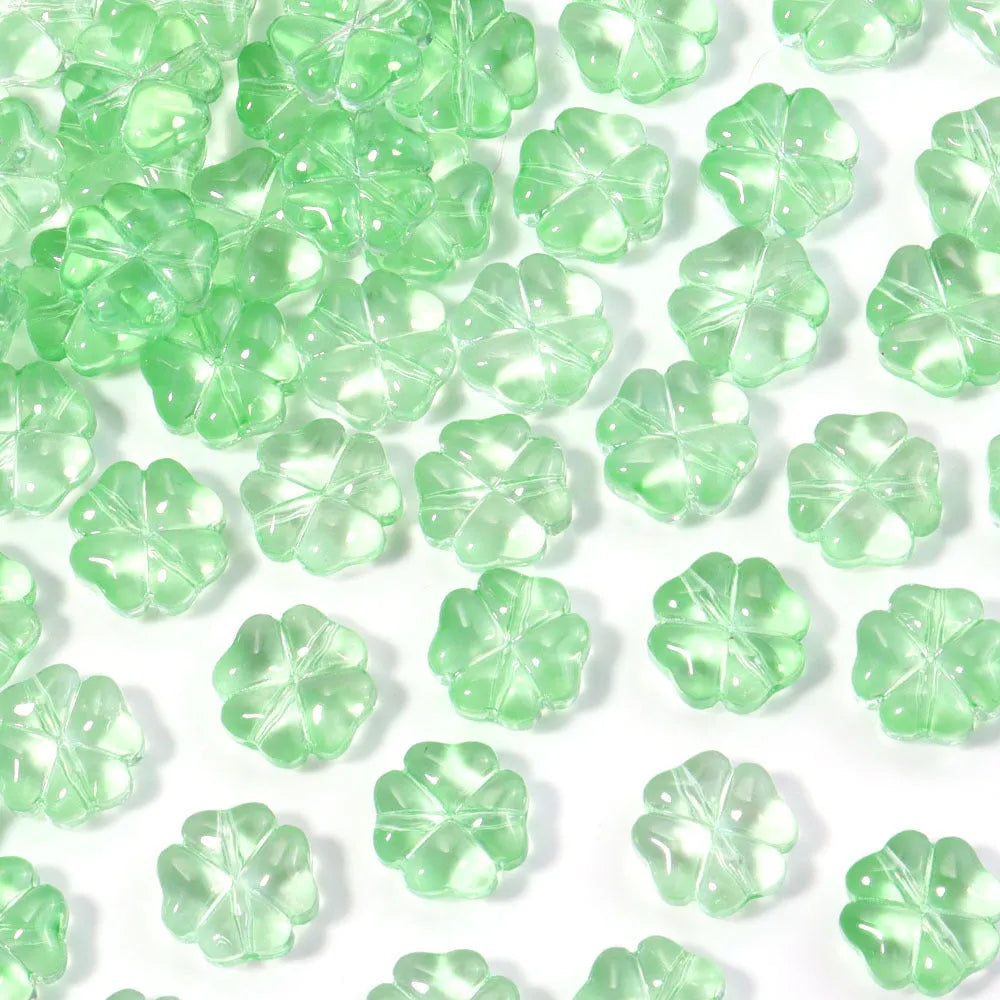 50 glass four-leaf clover beads in assorted colours with coloured glaze finish and 10mm straight hole design.