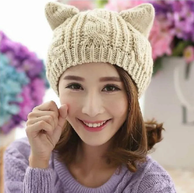 Hand made knitted cat ear beanie in winter colours with 3D design