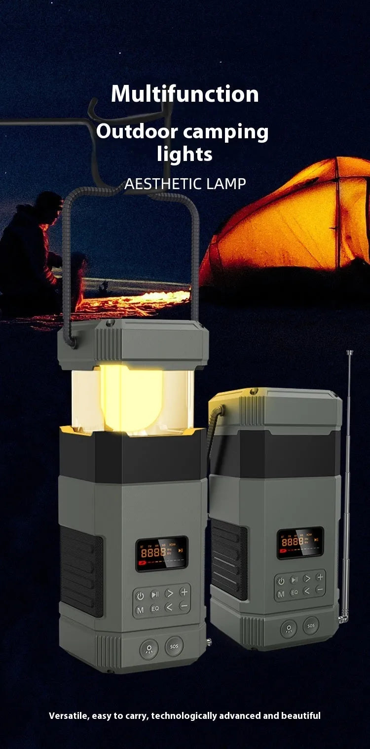 Solar radio Bluetooth speaker camping lantern with hand crank generator and power bank on outdoor background