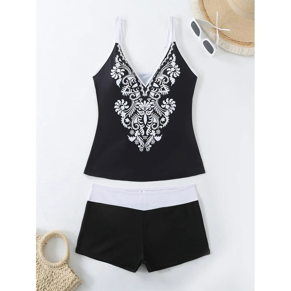 Women's black plus size brief swimsuit and swimming trunks set with a cotton lining.