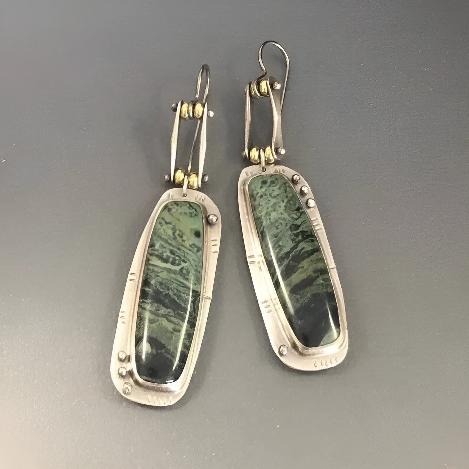 Geometric two-colour marble pattern alloy earrings with minimalist stud design