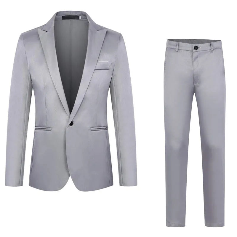 Man wearing a loose-fit grey wedding suit jacket, showing front and side detail.