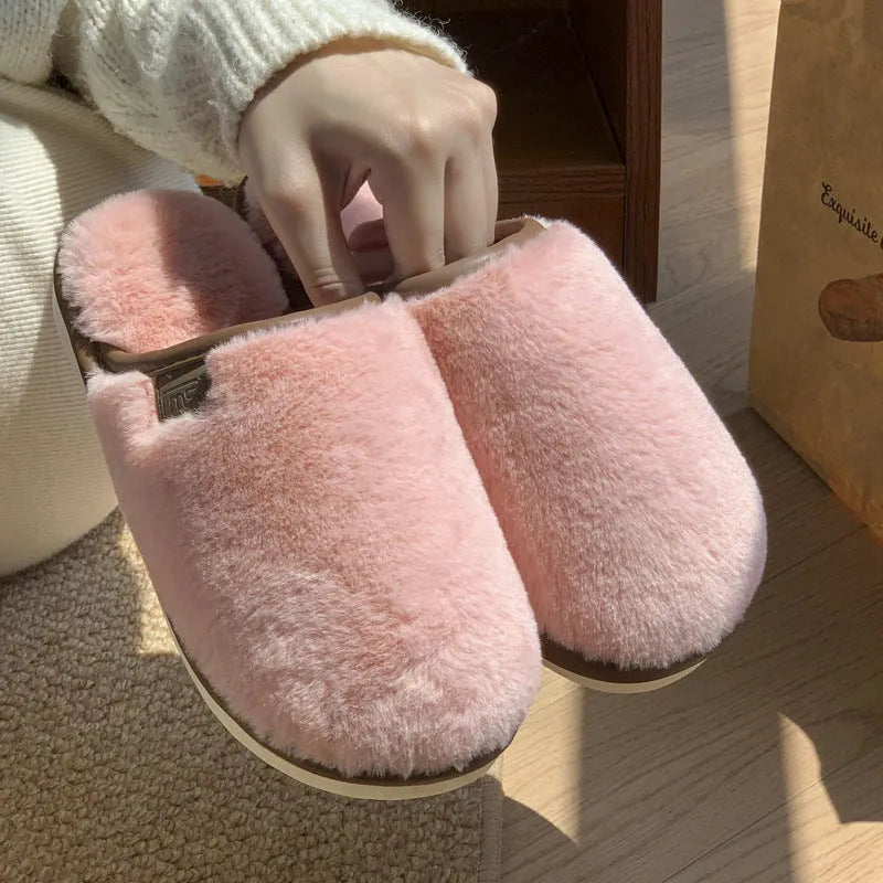 Blue PVC plush slipper with non-slip sole and car stitching detail on upper.