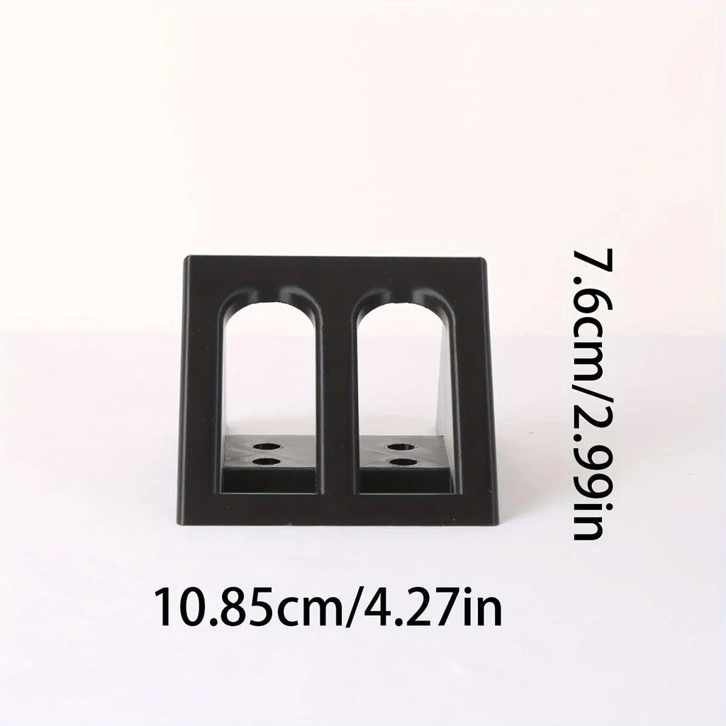 Black punk-style plastic pistol stand for firearm storage and display